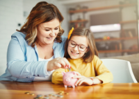 Mother and daughter counting money